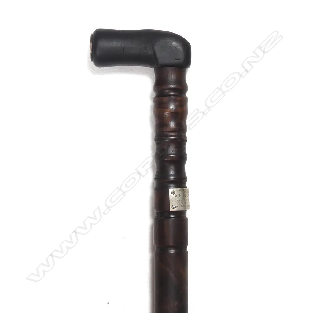 A sturdy turned mahogany walking stick Image 1++