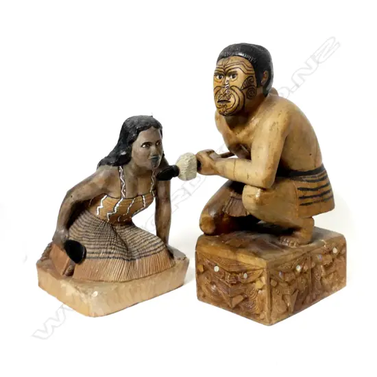 Two folk art carved wood Maori figures