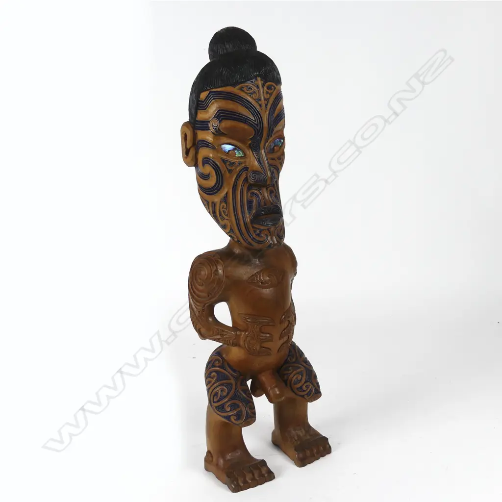 A mid/late-20thC quality Maori carved stylised figure Image 1++