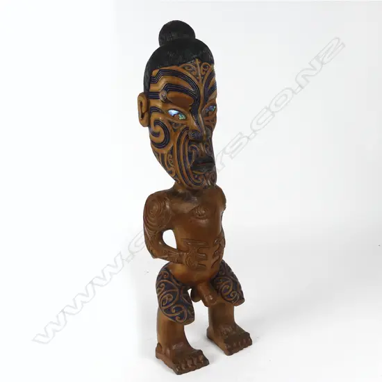 A mid/late-20thC quality Maori carved stylised figure