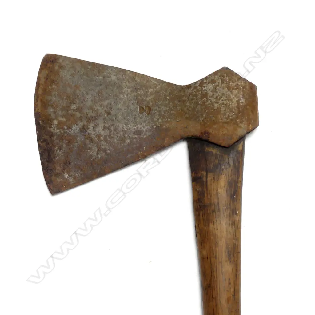 A New Hebrides/Vanuatu iron trade axe hafted on a wooden club handle Image 1++