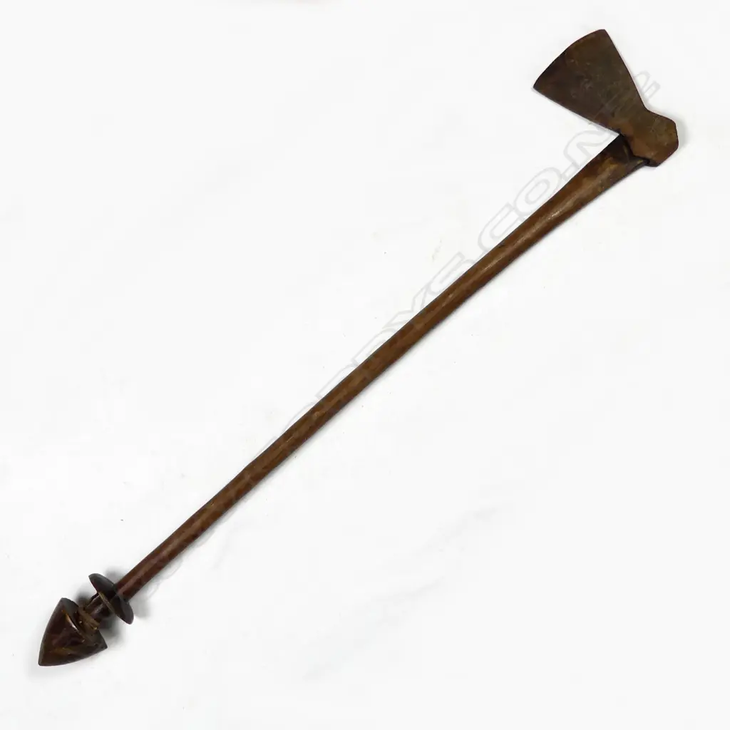A New Hebrides/Vanuatu iron trade axe hafted on a wooden club handle Image 1++