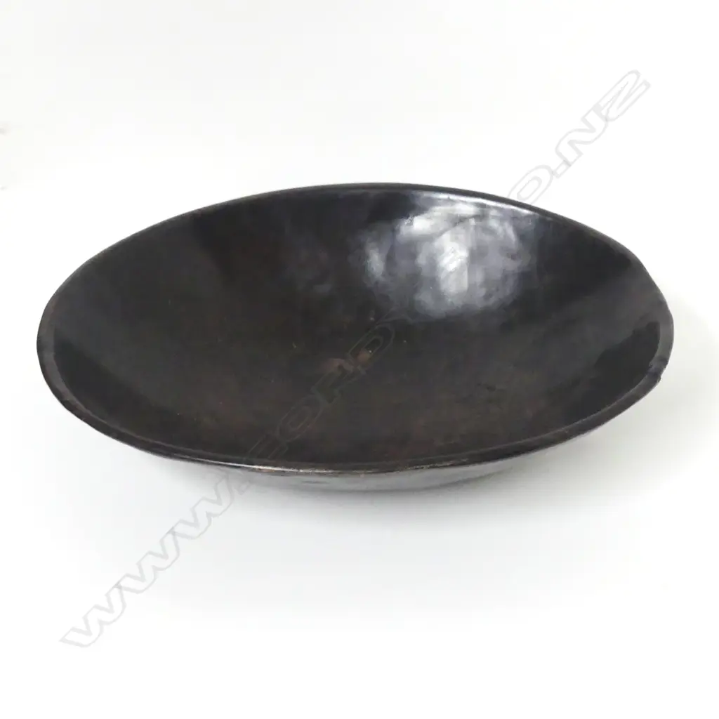 A Solomon Island burnished wooden oval bowl Image 1++