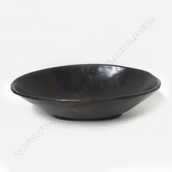 A Solomon Island burnished wooden oval bowl