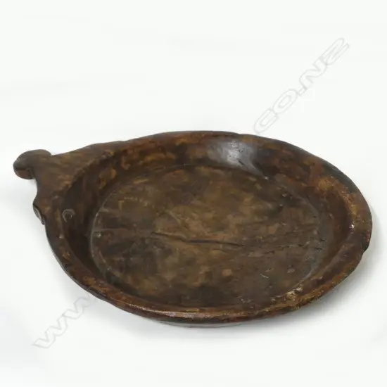 An Oceania wooden shallow dish