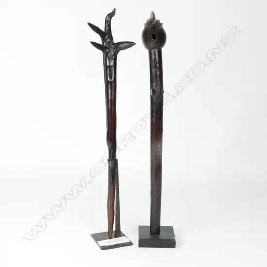 Two African wooden clubs