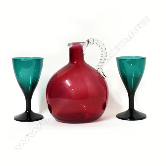 A pair of Victorian Bristol green wine glasses