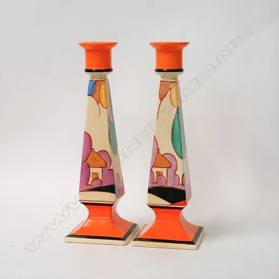 A rare pair of Clarice Cliff tall candlesticks in the Autumn blue pattern