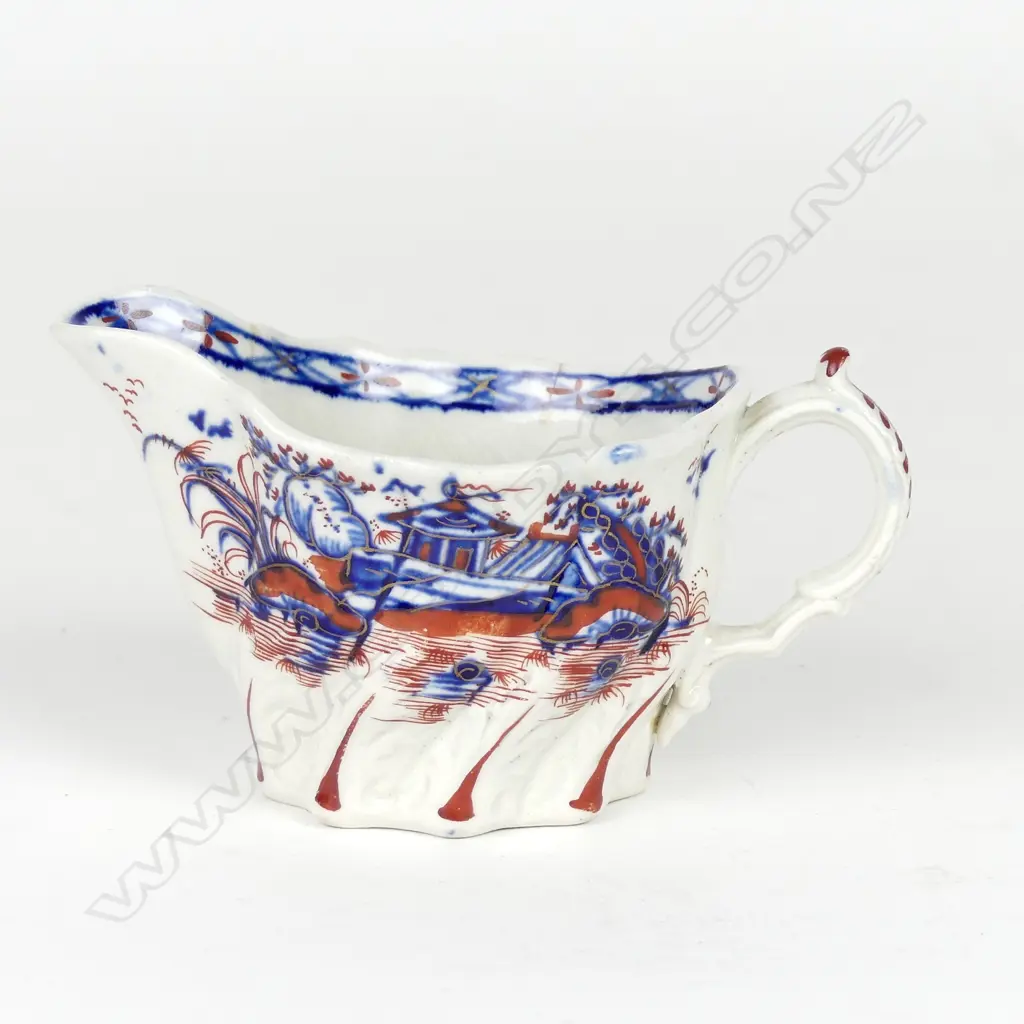 This lot and the following 25 lots are from the estate of Mervyn Hynes (1928-2018) who pursued a lifelong interest in collecting the earliest examples of English porcelain. An 18thC Seth Pennington (Liverpool) porcelain cream boat Image 1++