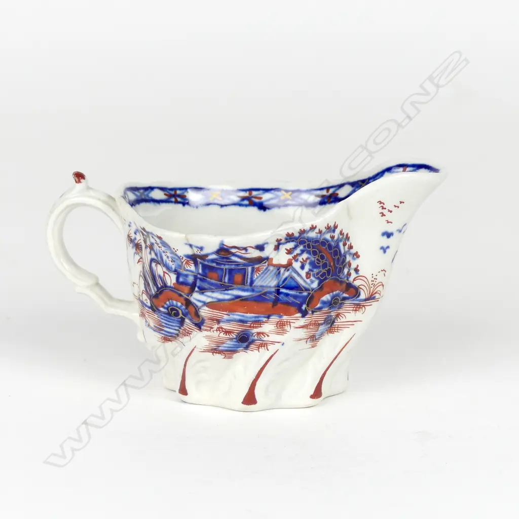 This lot and the following 25 lots are from the estate of Mervyn Hynes (1928-2018) who pursued a lifelong interest in collecting the earliest examples of English porcelain. An 18thC Seth Pennington (Liverpool) porcelain cream boat Image 1++