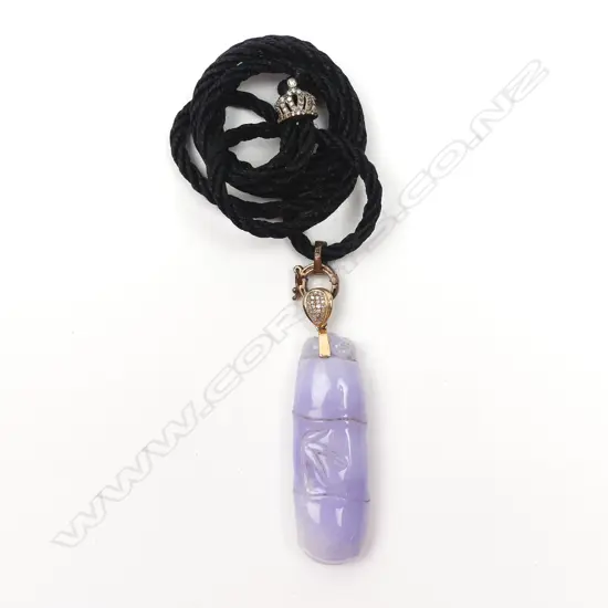 A Chinese carved lavender jade and diamond set 18ct. rose gold mounted pendant