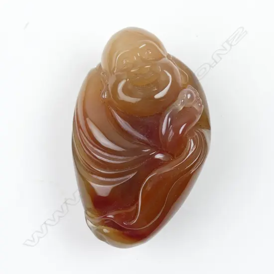 A Chinese carved agate handling piece