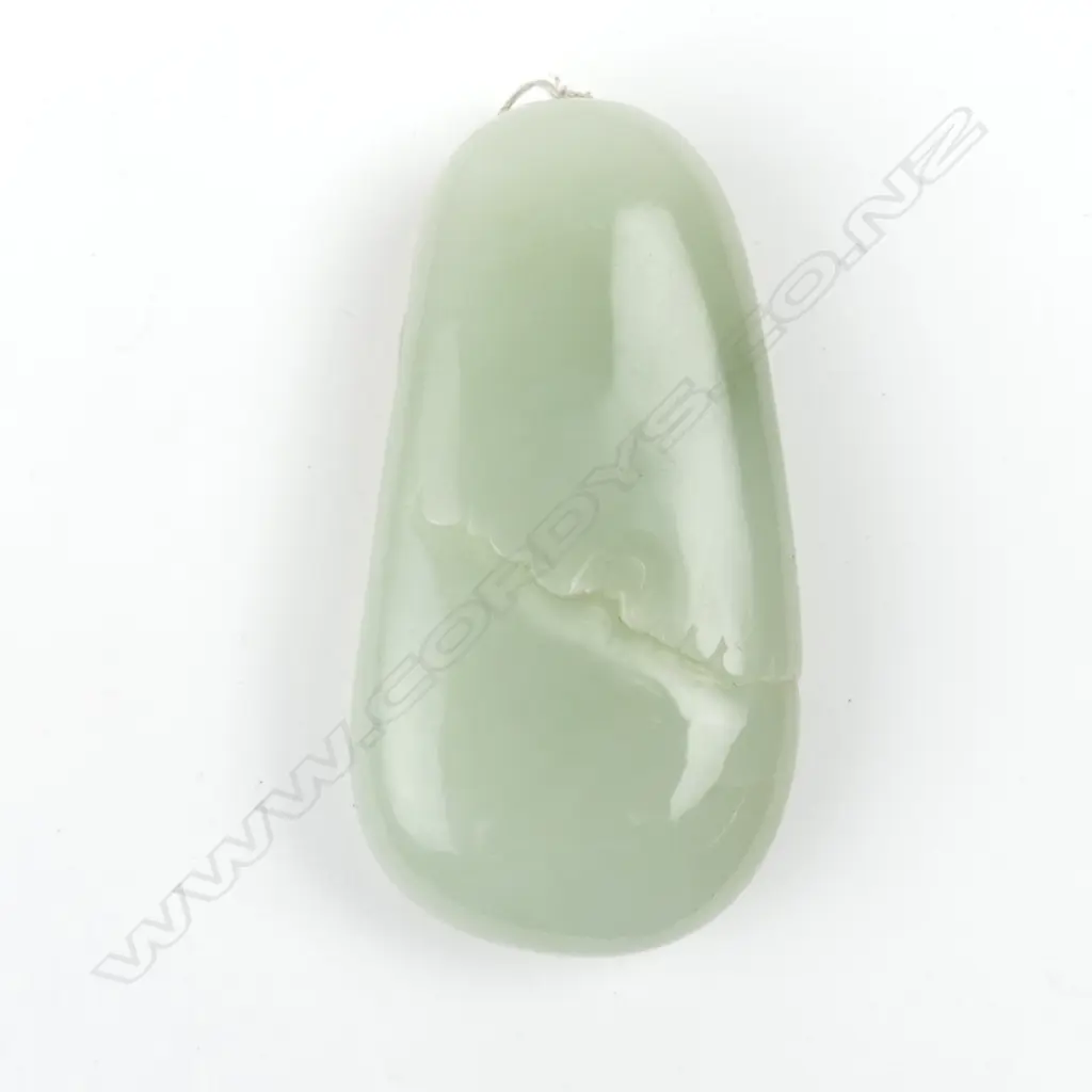A Chinese pale jade carved small boulder Image 1++