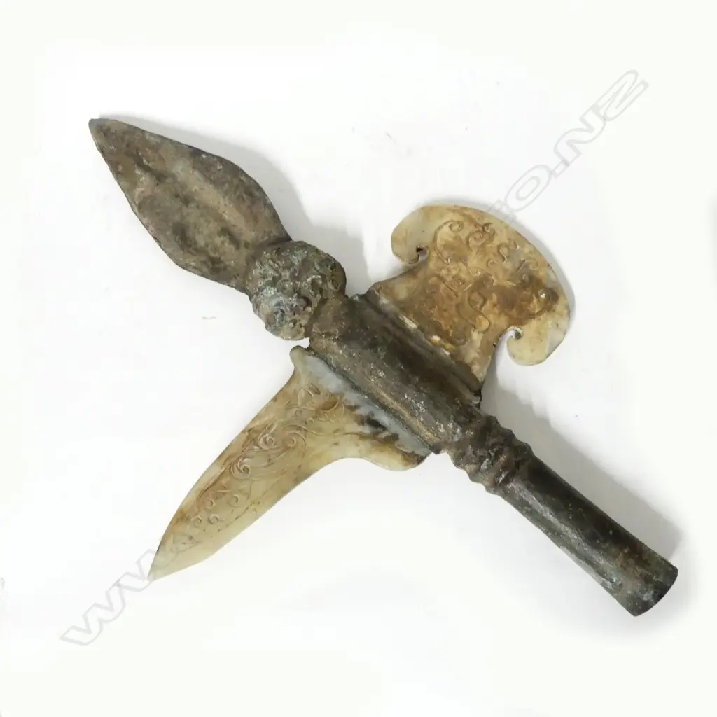 A metal and stone replica of an archaic Chinese halberd head Image 1++