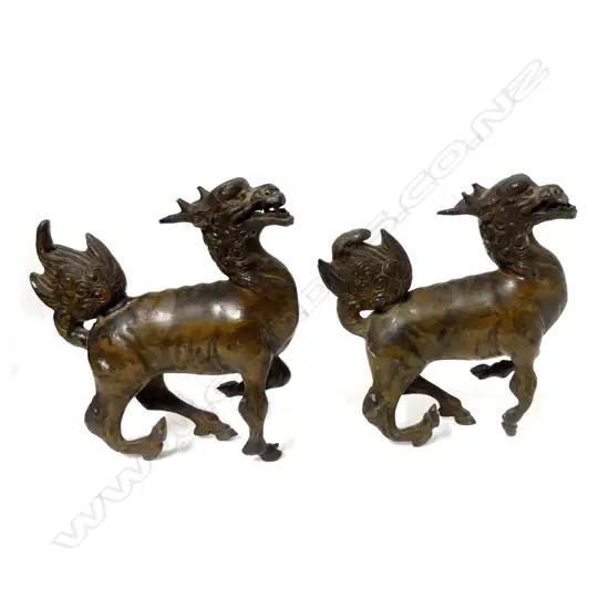 A pair of spelter  bronze kylin statuettes