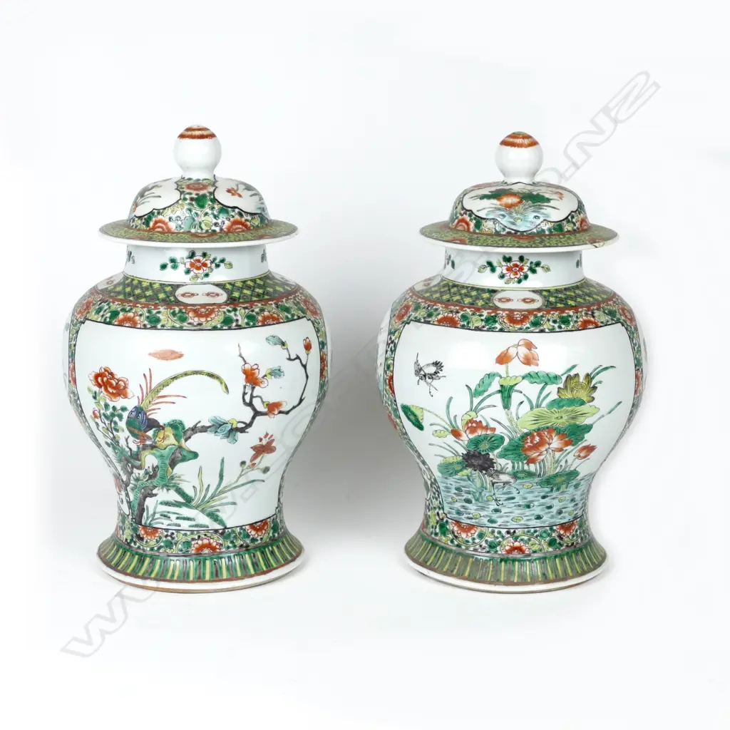 A pair of large Chinese lidded famille verte baluster vases painted with panels of birds Image 1++