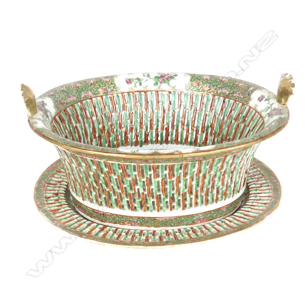 A Chinese famille rose porcelain reticulated walled bowl on saucer stand Image 1++