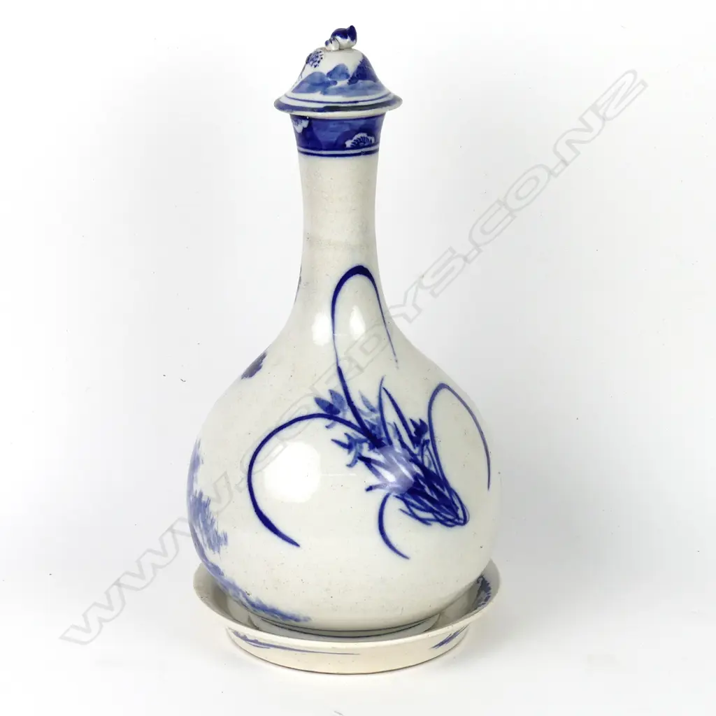 A Japanese Arita carafe and cover with saucer Image 1++