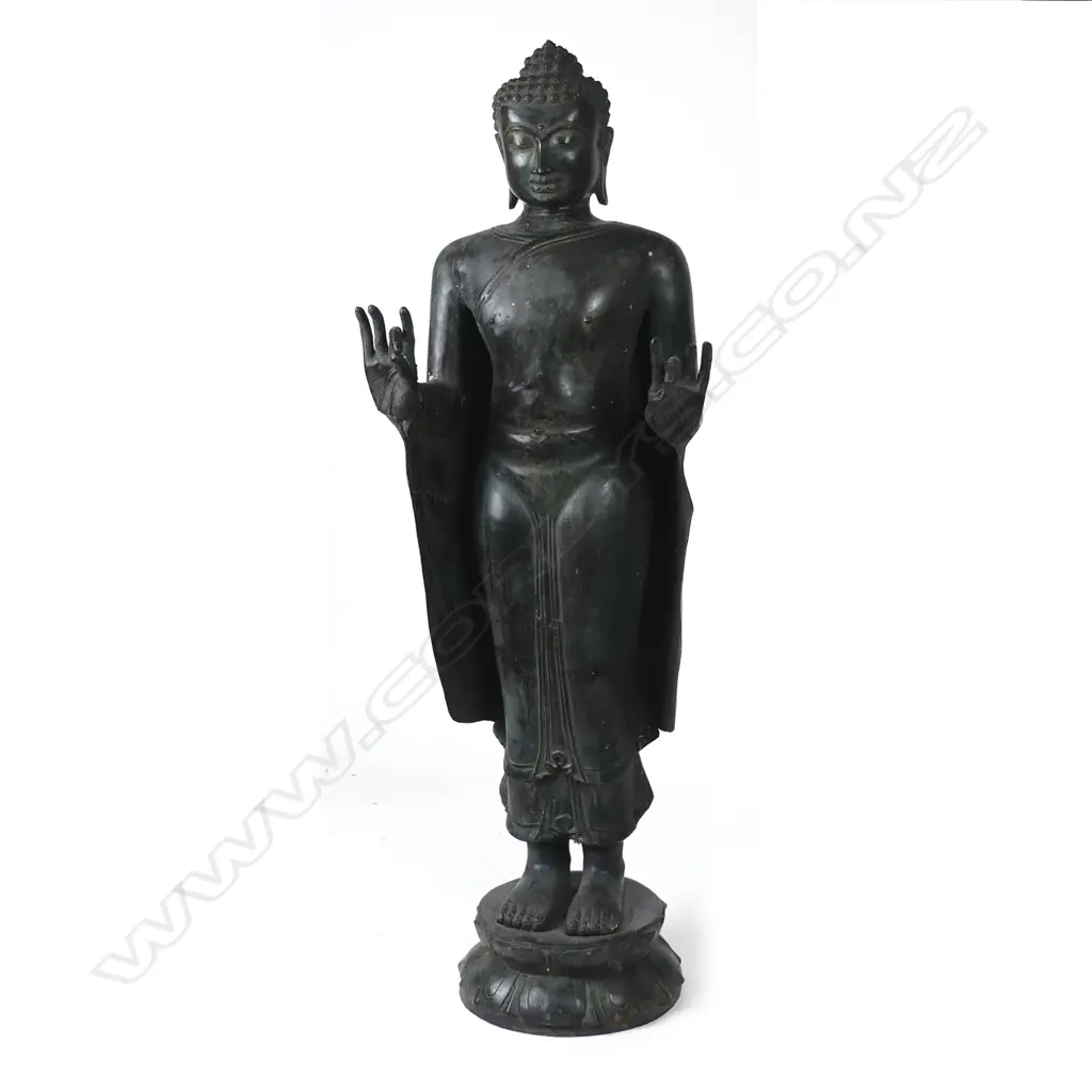 A large Eastern bronze standing Buddha figure Image 1++