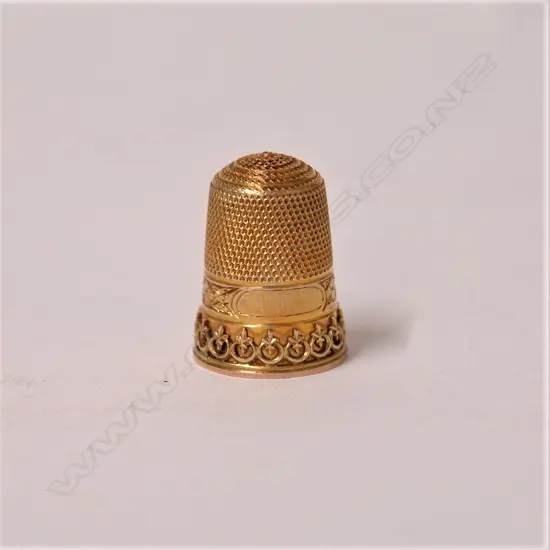 An early 20thC 9ct. yellow gold thimble