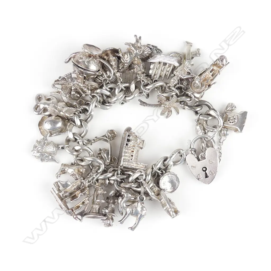 A silver charm bracelet Image 1++