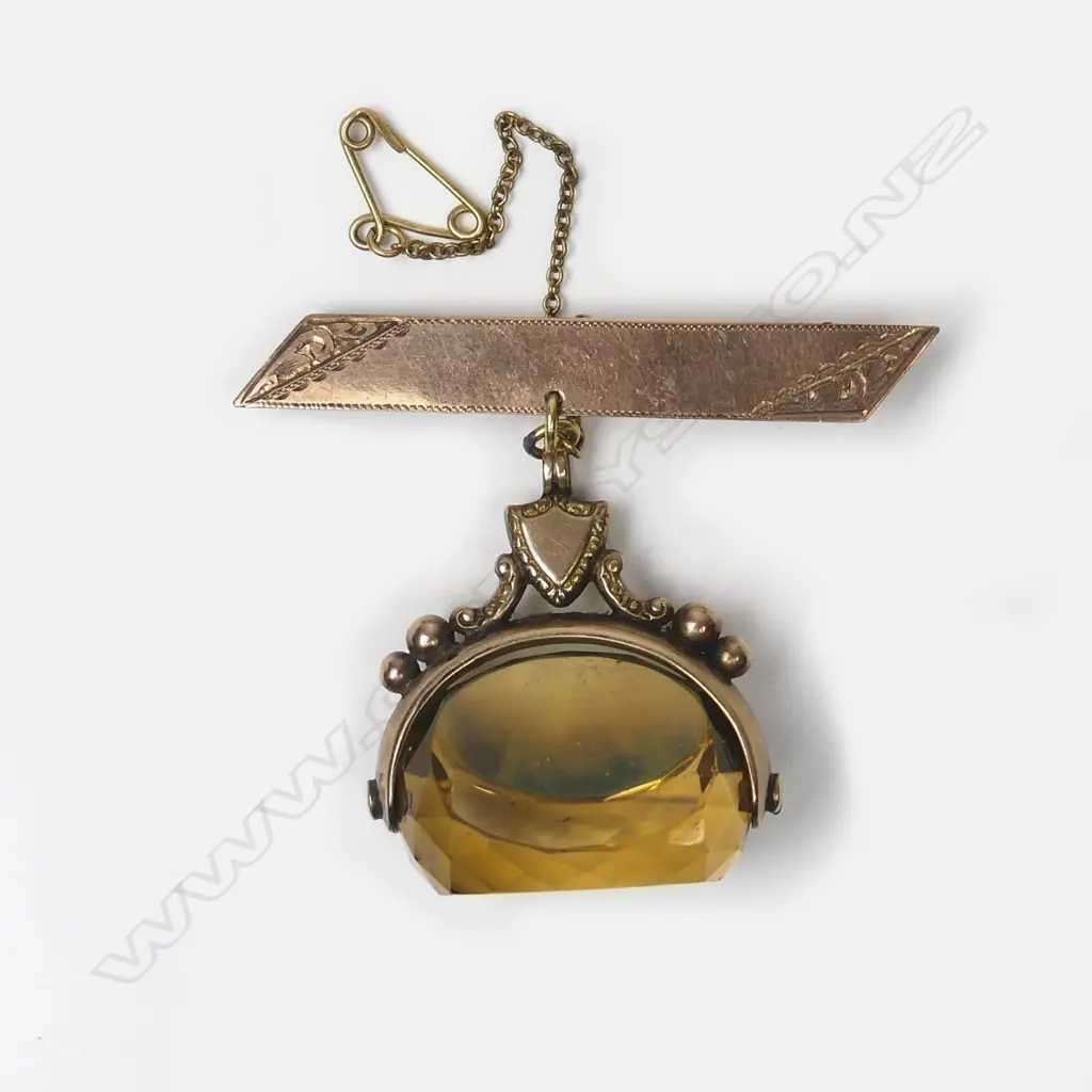 A 9ct rose gold and citrine spinner Image 1++
