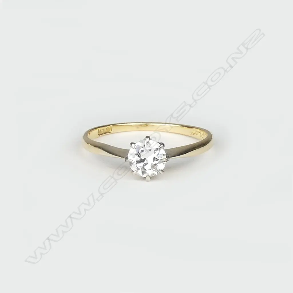 An 18ct gold and diamond solitaire ring Image 1++