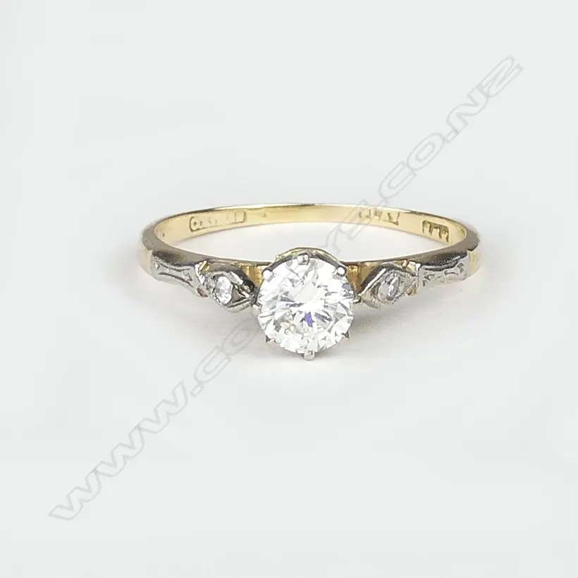 An 18ct gold and diamond solitaire ring Image 1++