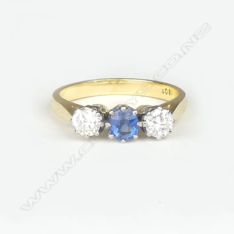 An 18ct gold sapphire and diamond ring Image 1++