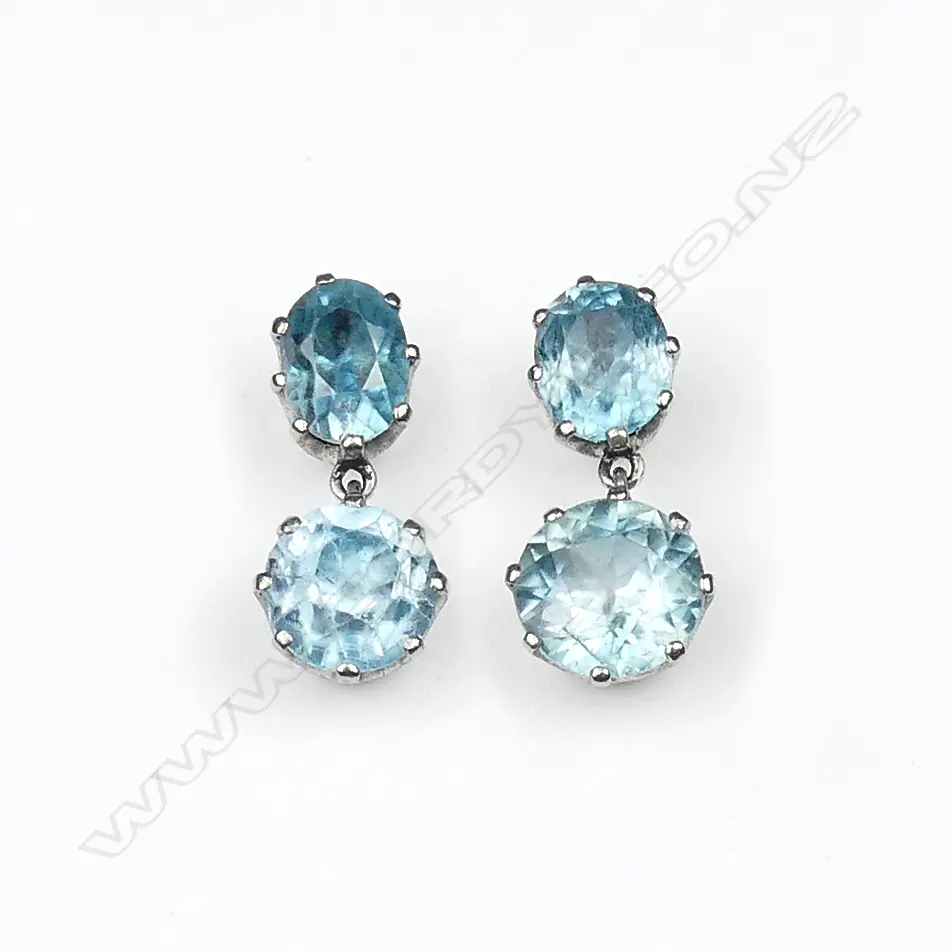 A pair of 9ct white gold and aquamarine earrings Image 1++
