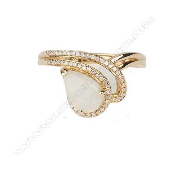 An 18ct. rose gold opal and diamond modern dress ring