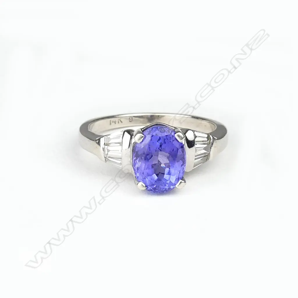 A 14ct white gold tanzanite and diamond ring Image 1++