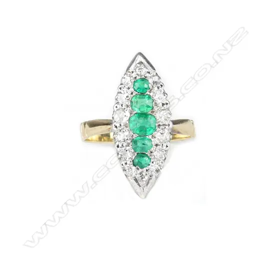 An estate 18ct. yellow gold emerald and diamond ring