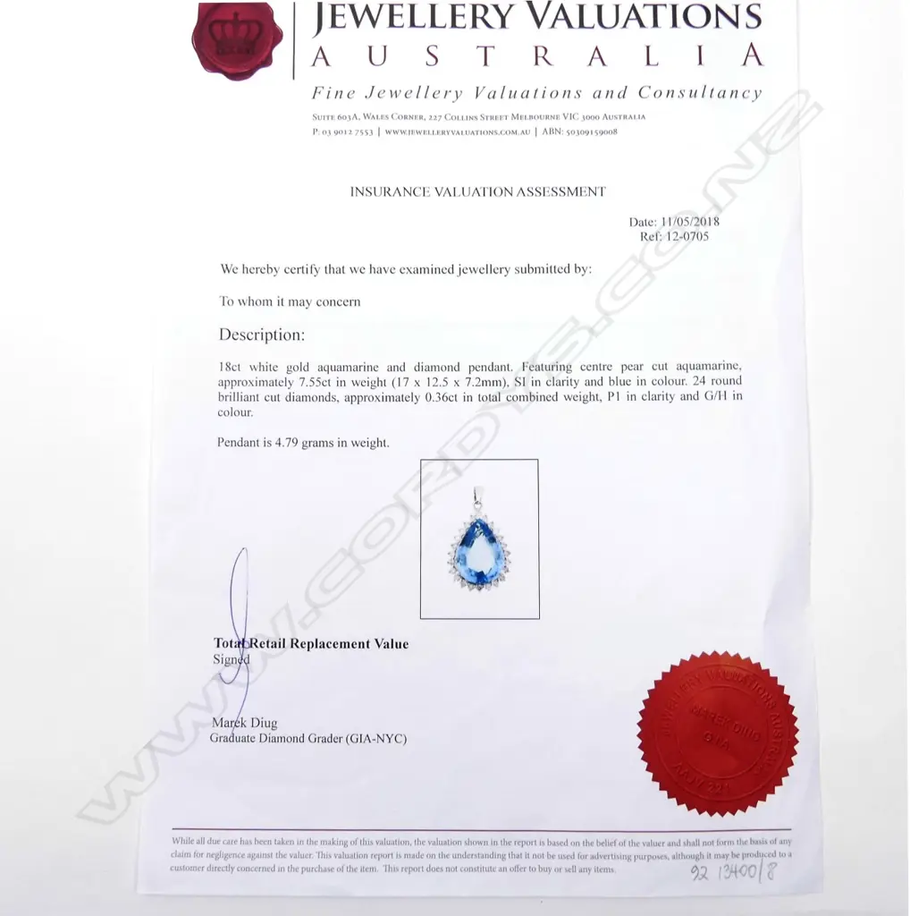 An 18ct white gold aquamarine and diamond pendant Image 1++