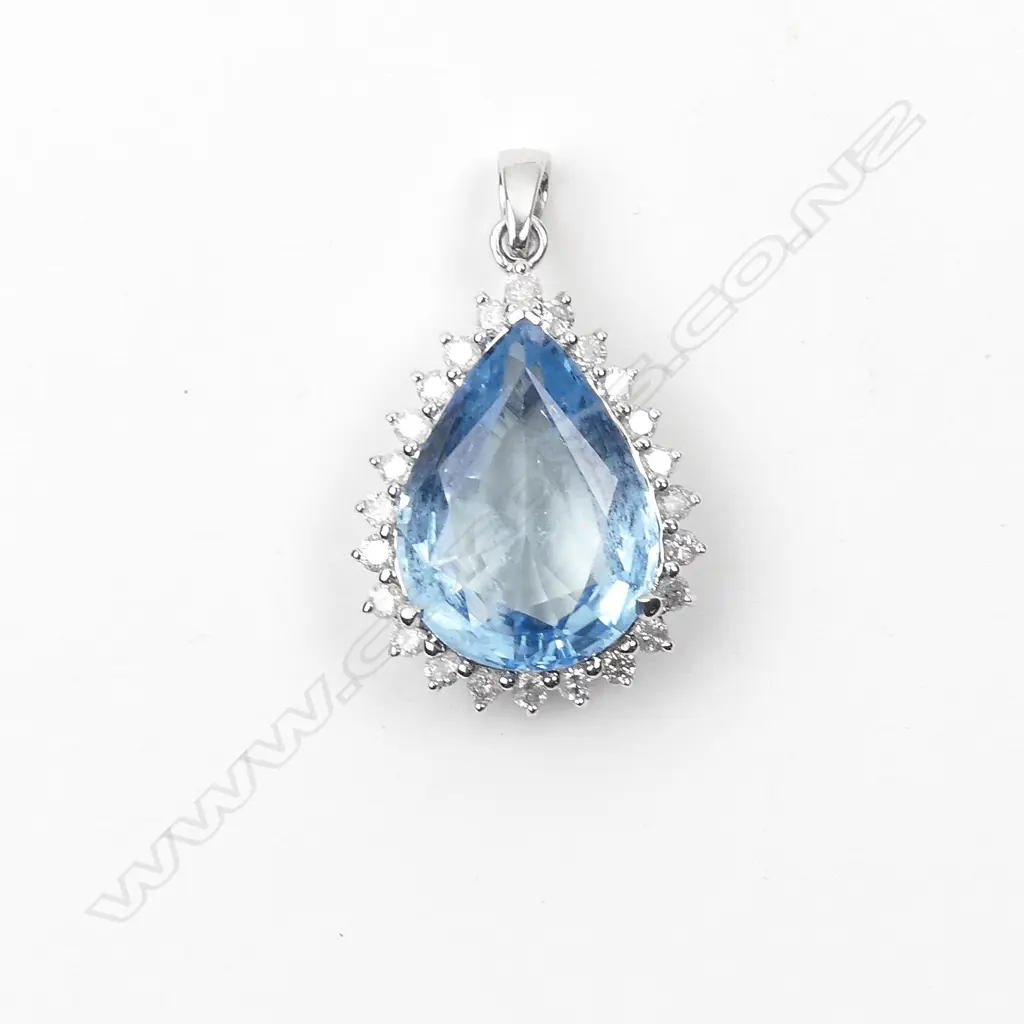 An 18ct white gold aquamarine and diamond pendant Image 1++