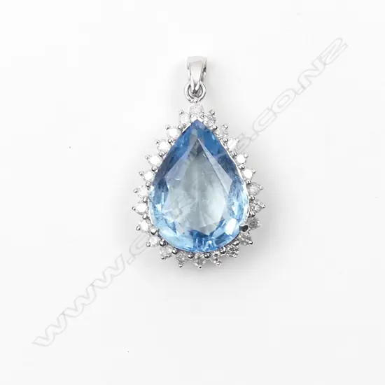 An 18ct white gold aquamarine and diamond pendant