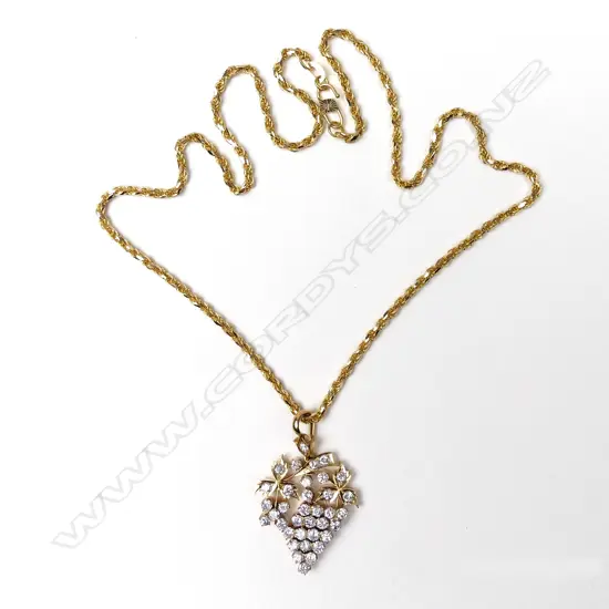 A 20ct gold and diamond pendant