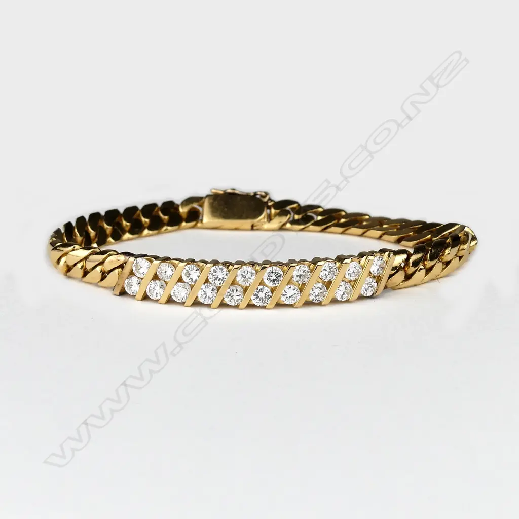 A 21ct gold and diamond bracelet Image 1++