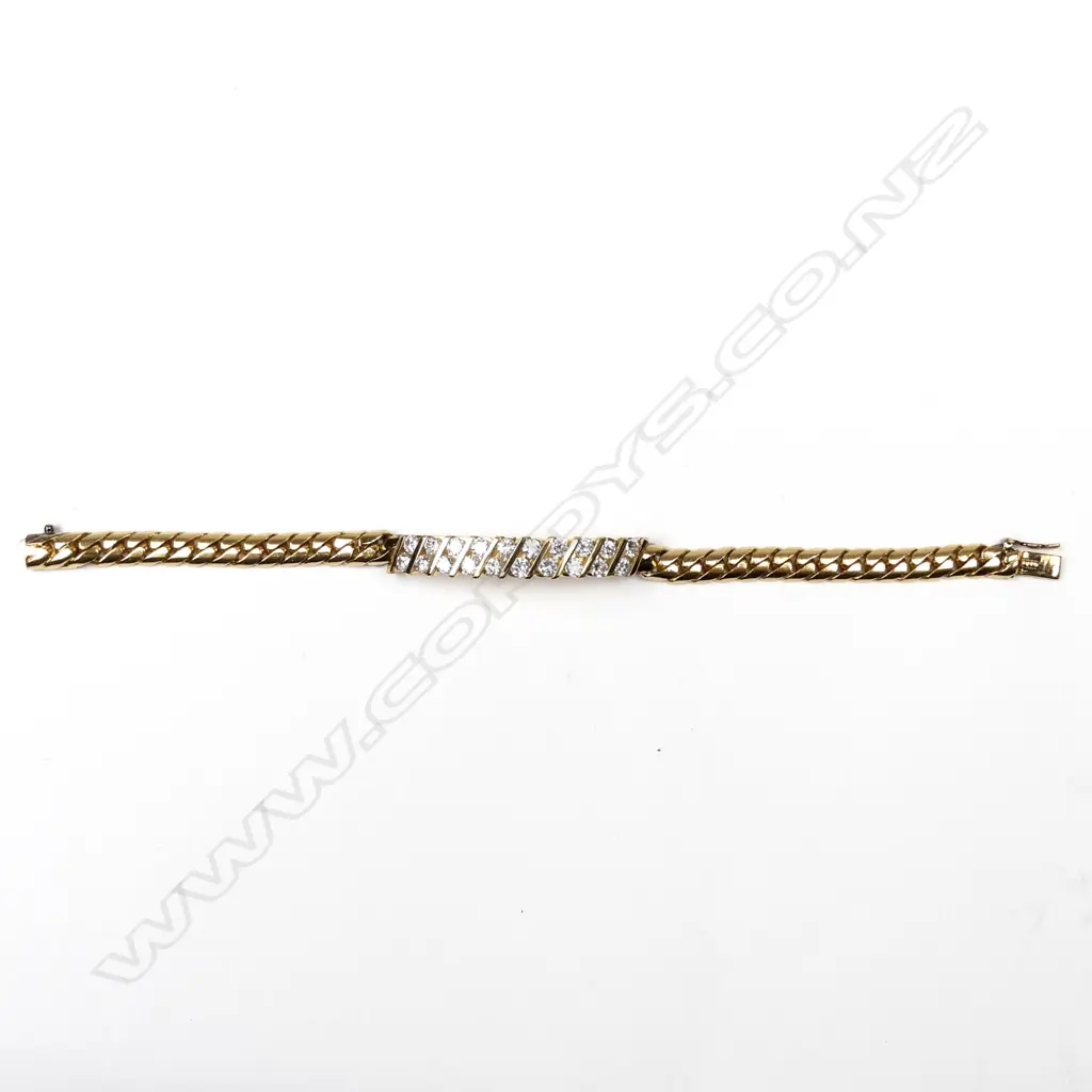 A 21ct gold and diamond bracelet Image 1++