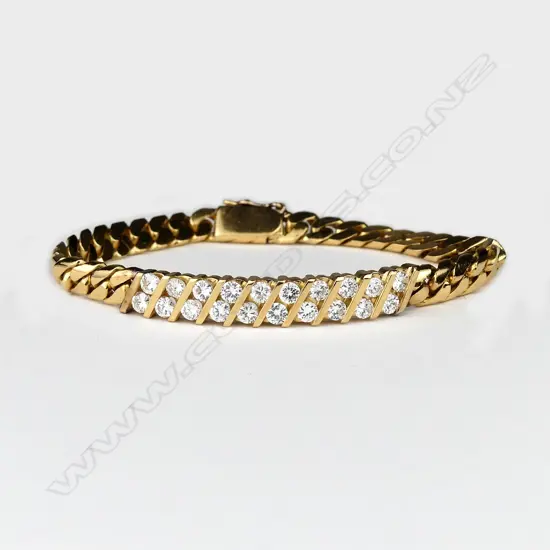 A 21ct gold and diamond bracelet