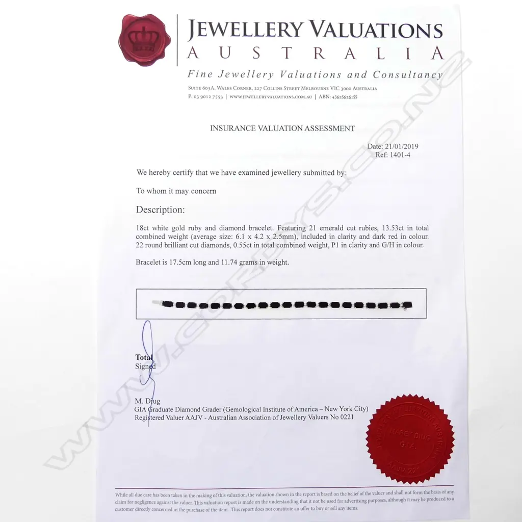 An 18ct white gold ruby and diamond tennis bracelet Image 1++