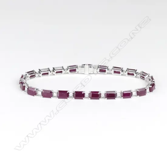 An 18ct white gold ruby and diamond tennis bracelet