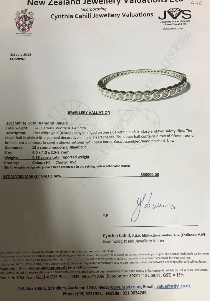 An impressive lady's modern 18ct. white gold and diamond set bangle Image 1++