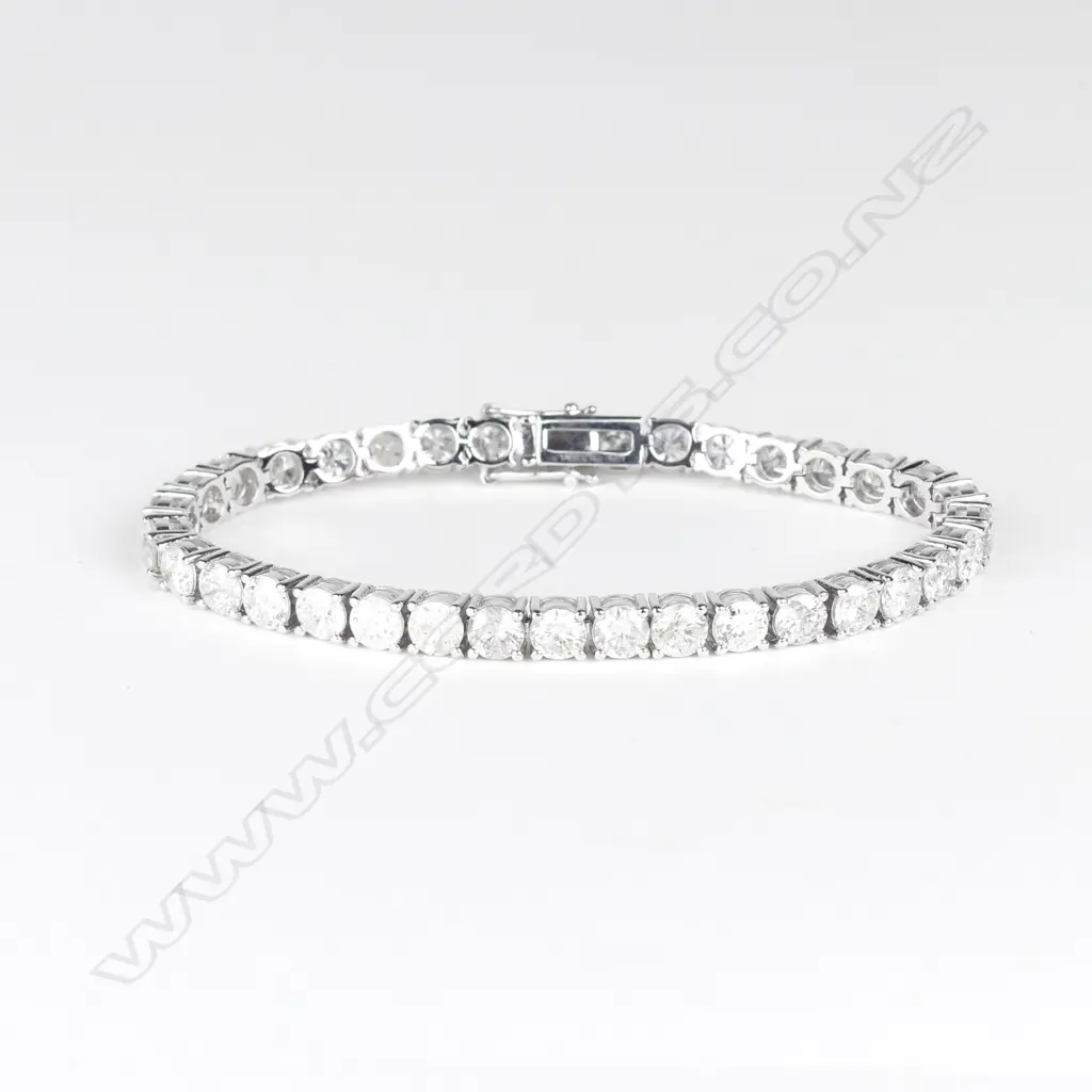 A 14ct white gold and diamond tennis bracelet Image 1++