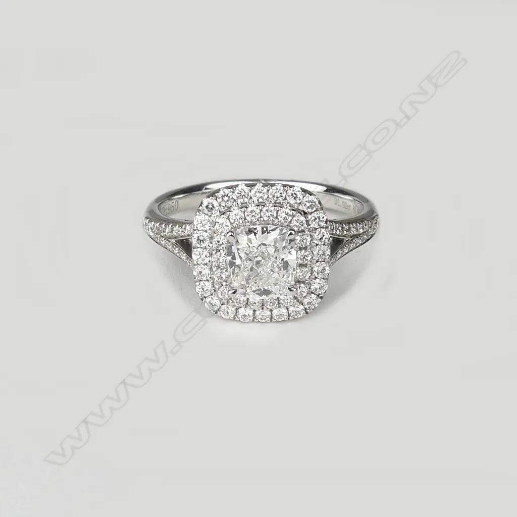 An 18ct. lady's modern white gold diamond cluster ring Image 1++