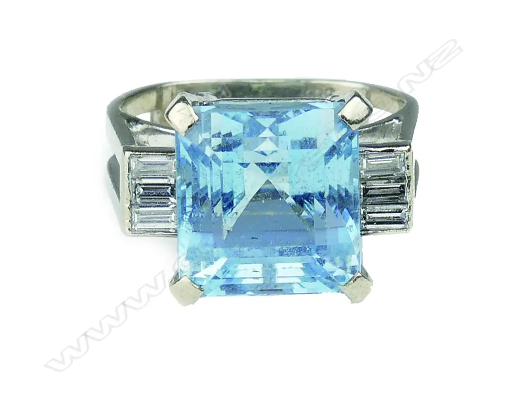 A good 14ct white gold lady's handmade large aquamarine and diamond dress ring Image 1++