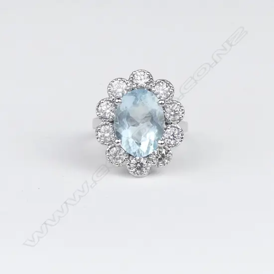 A 14ct white gold aquamarine and diamond ring