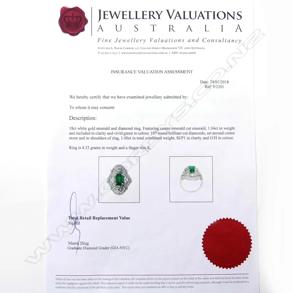 An 18ct white gold emerald and diamond Art Deco style ring Image 1++