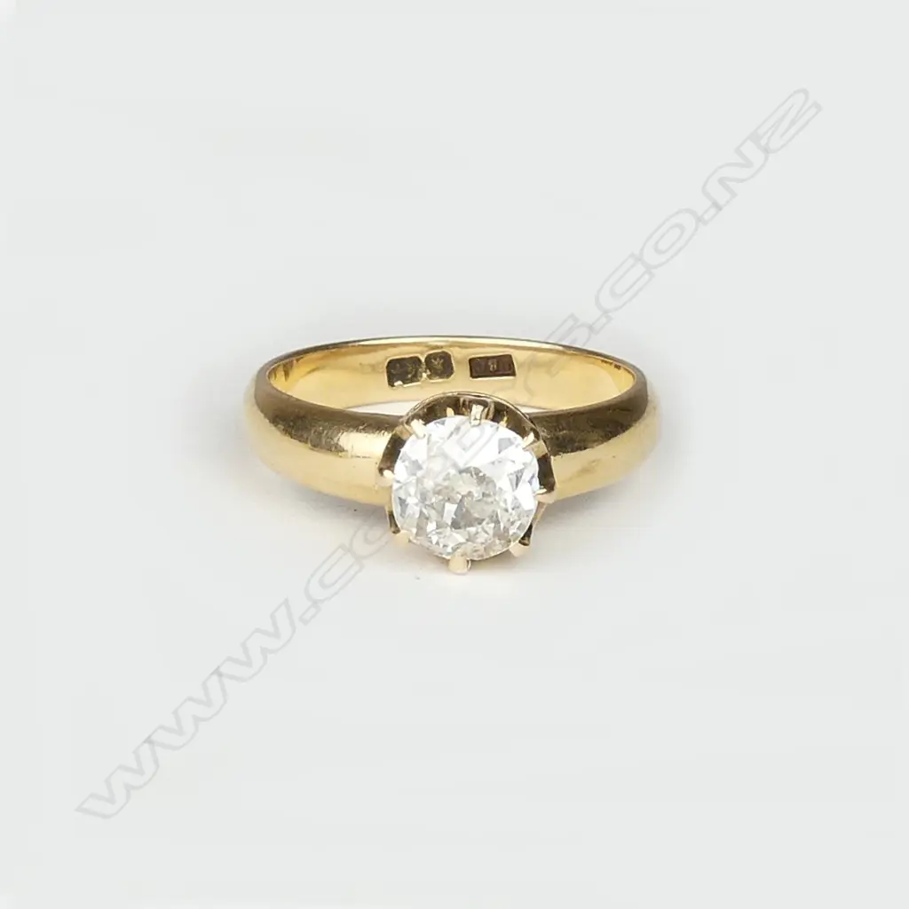 An 18ct gold and diamond solitaire ring Image 1++