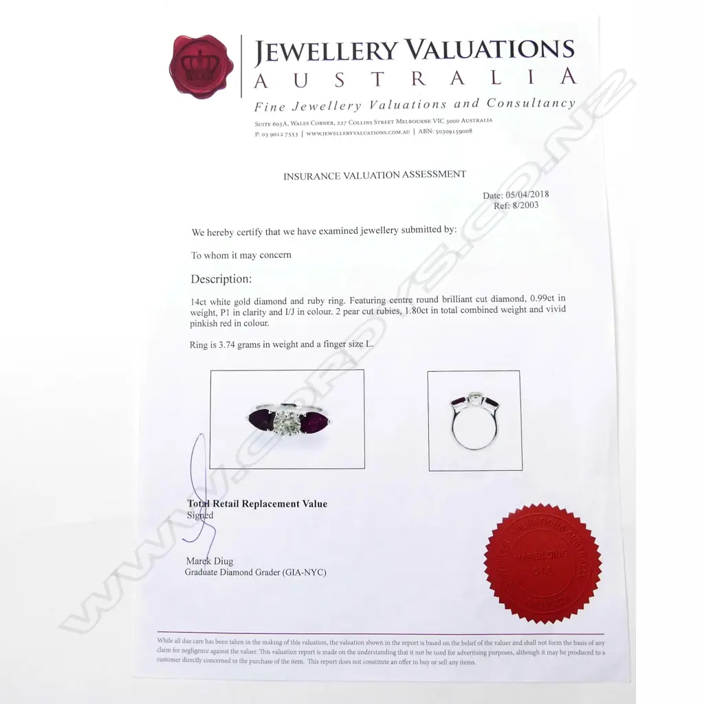 A 14ct white gold diamond and ruby ring Image 1++